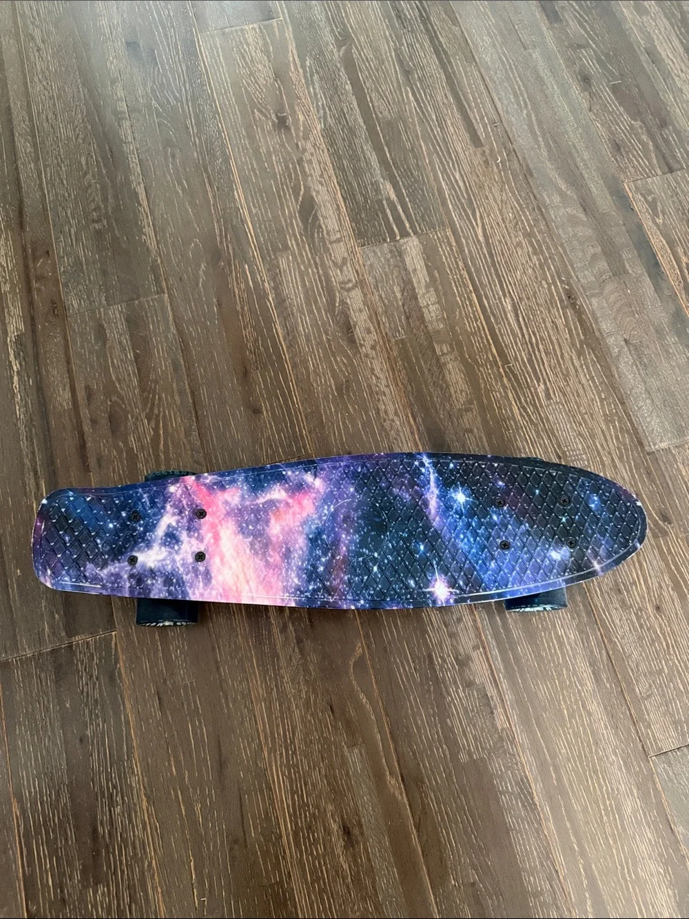 Galaxy Print Skateboard Wall Accent in Purple and Pink